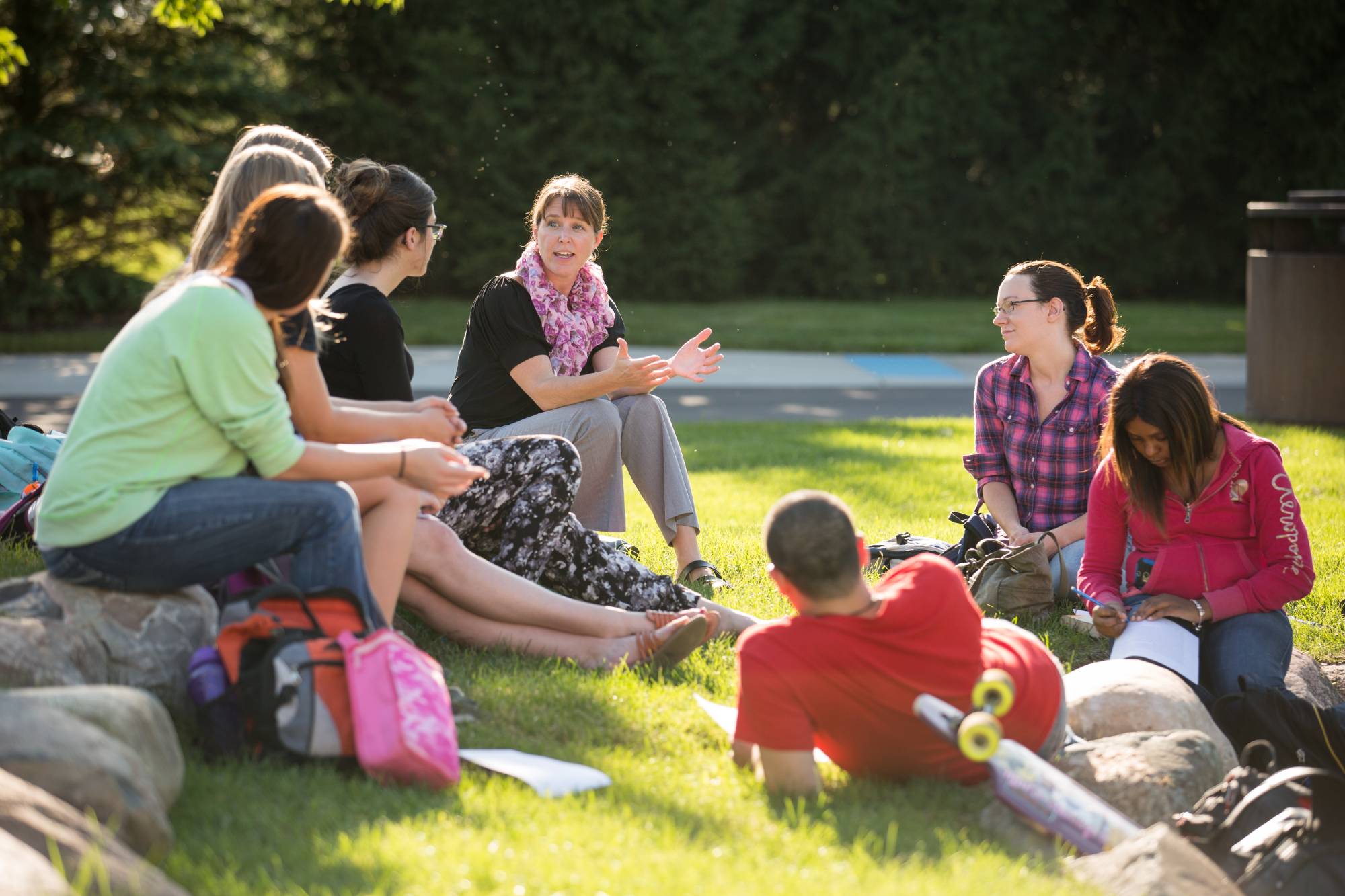 students and faculty talking